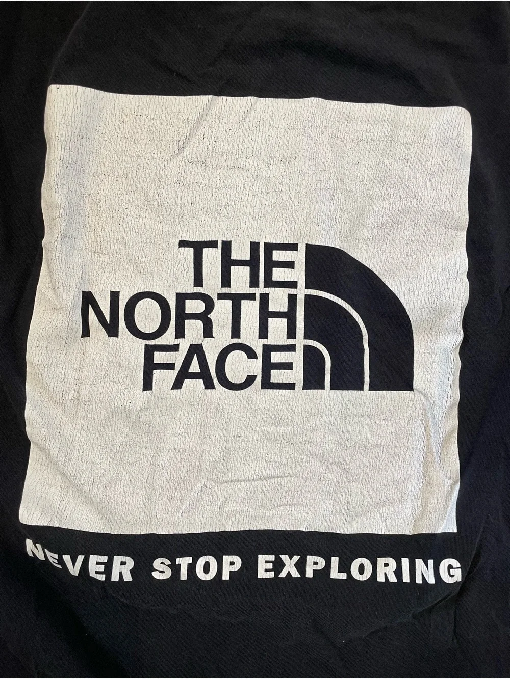 The North Face Black Graphic Tee - 'Never Stop Exploring'